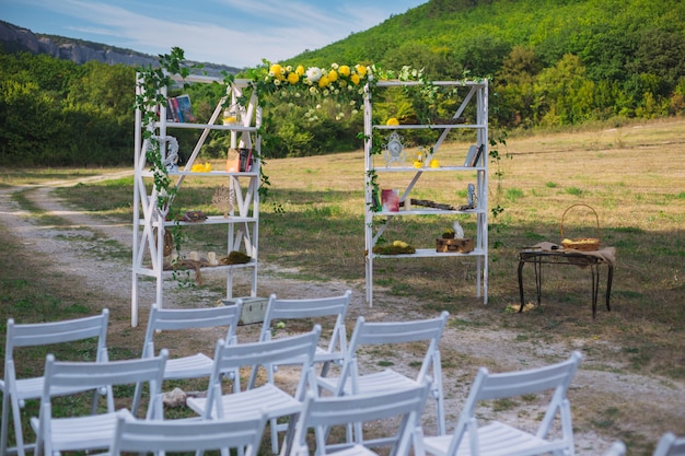 Wedding decor. Wedding on a plate green and a mountains. Wedding decorations, pears and moss. Tints of green and yellow