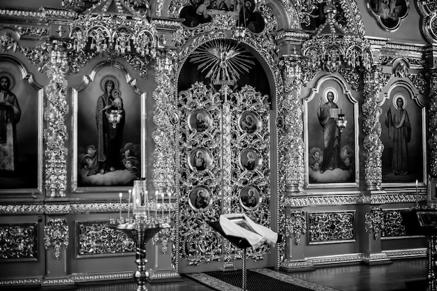 Wedding details inside a church at a Christian wedding. black and white photo