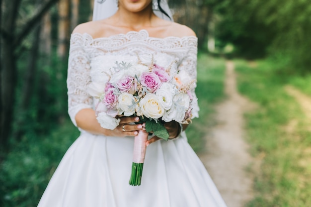 wedding dress, wedding rings, wedding bouquet