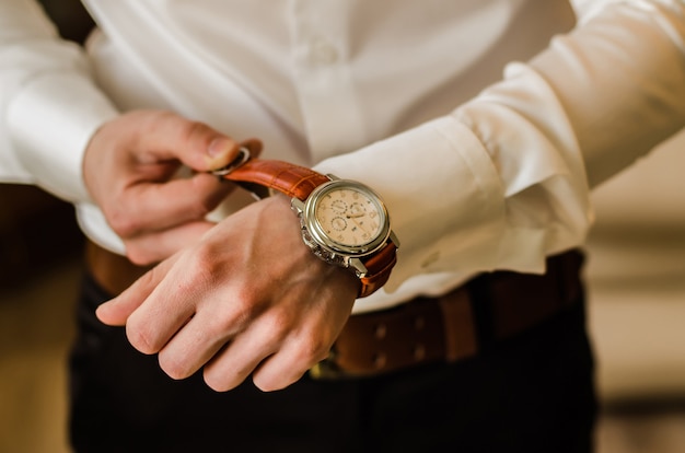 Wedding groom suit, white shirt, brown pants, watch