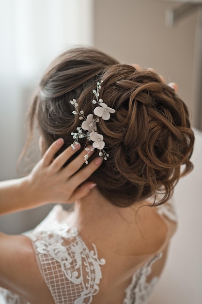 Wedding hair decoration made of beads in the brides hairstyle 2503