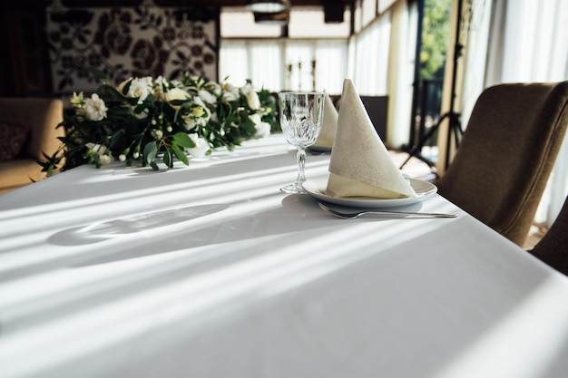 Wedding table setting for guests in a restaurant