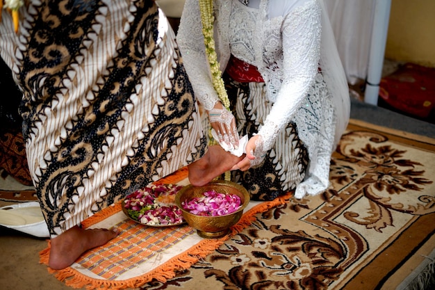 Wedding Tradition in Indonesia the Bride Washes the Groom's Feet