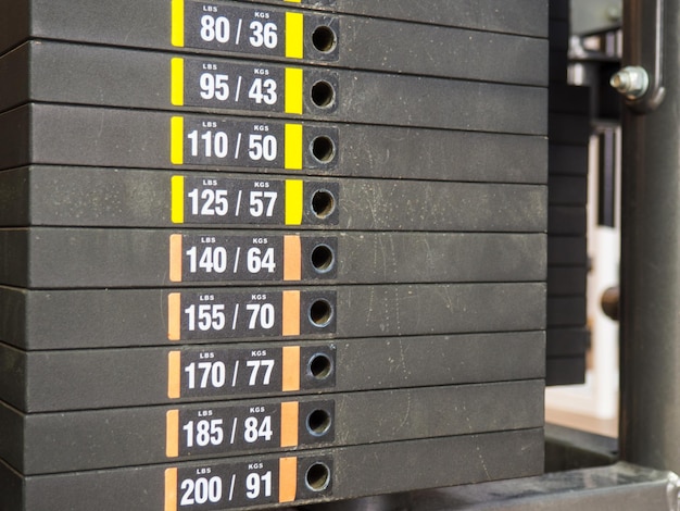 Weight stack in the gym closeup sports concept