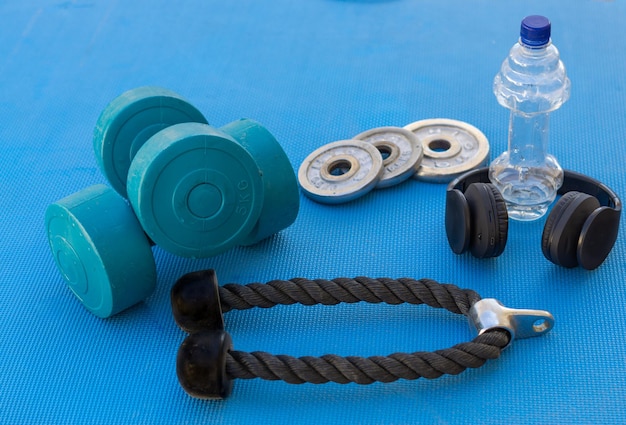 weights and fitness training equipment on the gym floor