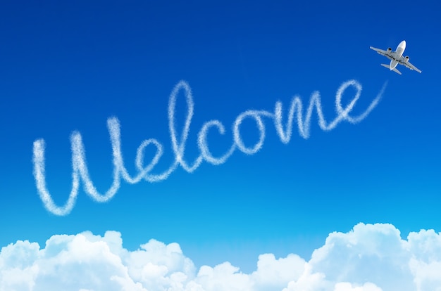 Welcome - inscription in the sky left by airplane.