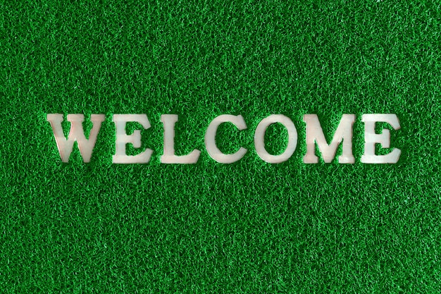 Welcome word plastic with rubber capet colorful in red green blue.