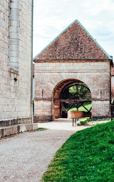 Well at Citadel of Besancon in Bourgogne Franche-Comte region of France. French Castle and medieval stone fortress in Burgundy. Fortress architecture and cityscape.