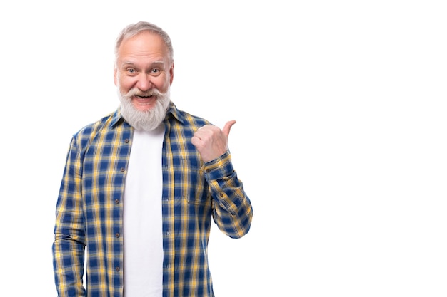 Wellgroomed s middleaged grayhaired retired man with a mustache and beard points with a finger at