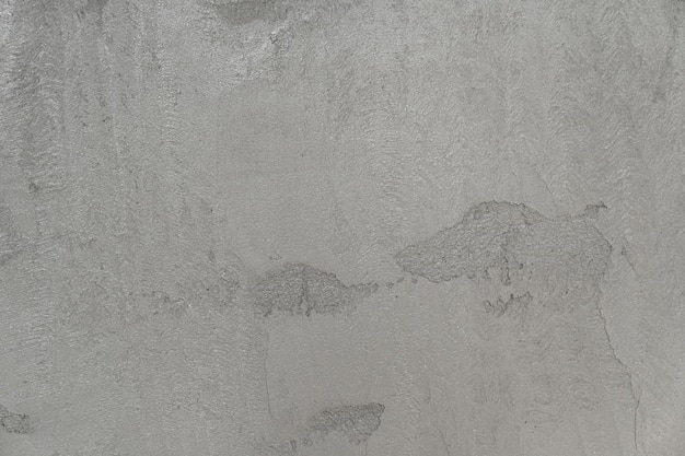 Wet cement wall texture in building construction for background