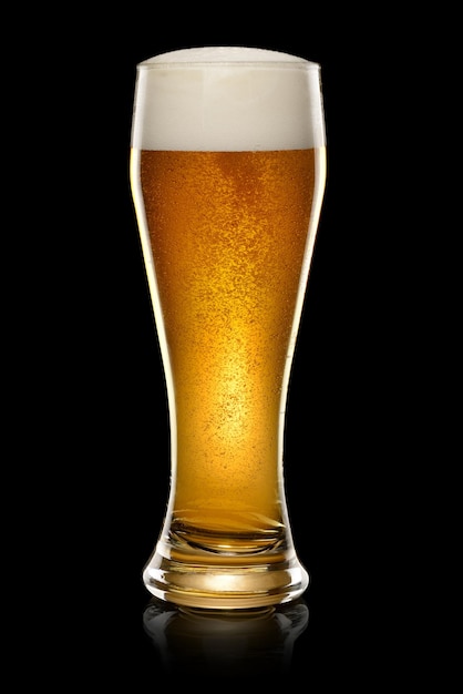 Wet Glass of fresh beer isolated on black background With clipping path