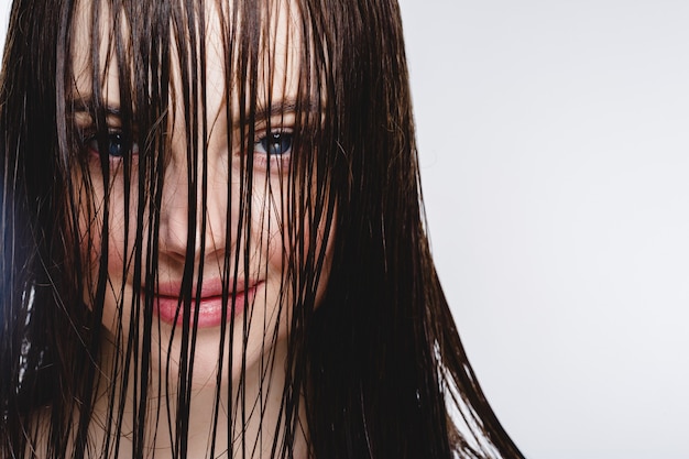 Wet hair woman portrait, beauty hair healthy skin care concept, beautiful model with wet hair isolated on white.