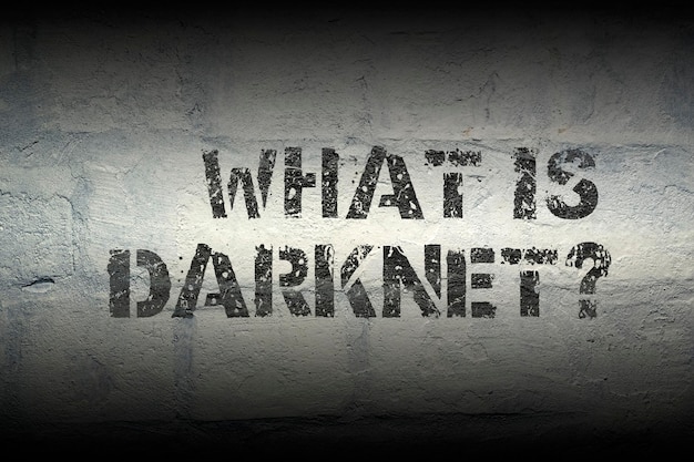 what is darknet question stencil print on the grunge white brick wall