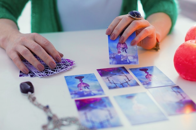 What is the meaning. Tarot card being in fortune tellers hands while being ready to be opened