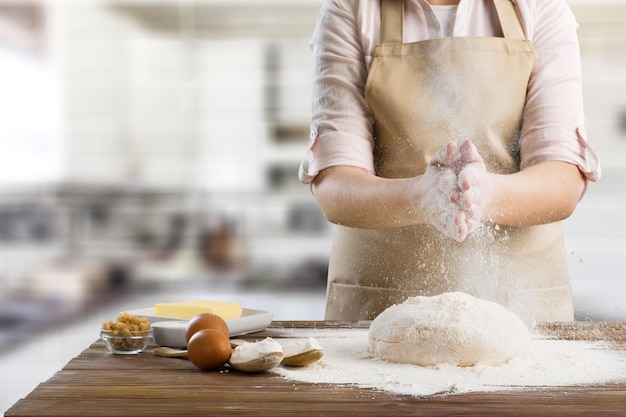 Wheat ears and flour on  background