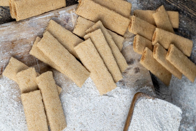 Wheat long cookies stuffed with mashed different fruits