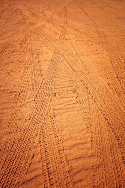 wheel tracks on desert sand