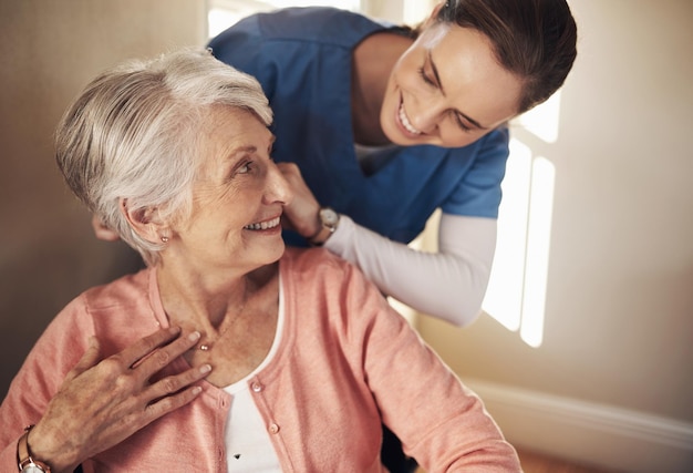 Whenever you need me Ill be right with you Shot of a senior woman in a wheelchair being cared for a nurse