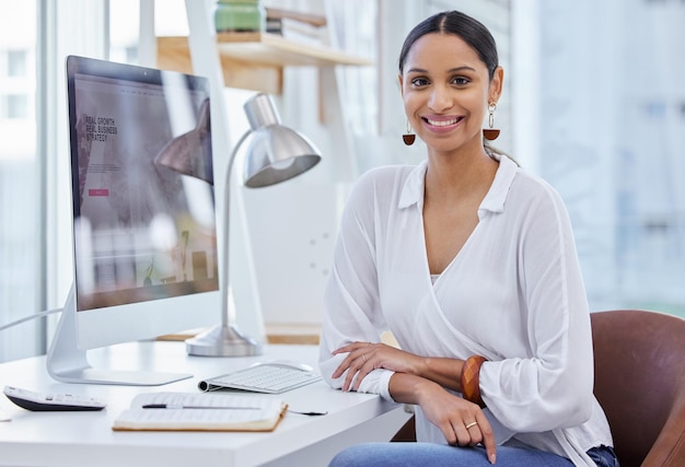 Where others fail youll prevail in time Portrait of a young businesswoman sitting at a desk in a modern office