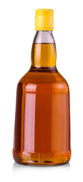 Whiskey bottle isolated over a whte background with clipping path