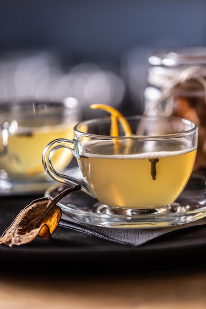 Whiskey drink Hot Toddy with dried pears Mulled wine flavored with cloves and orange peel