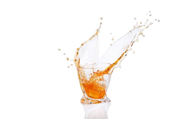 Whiskey with splash in glass