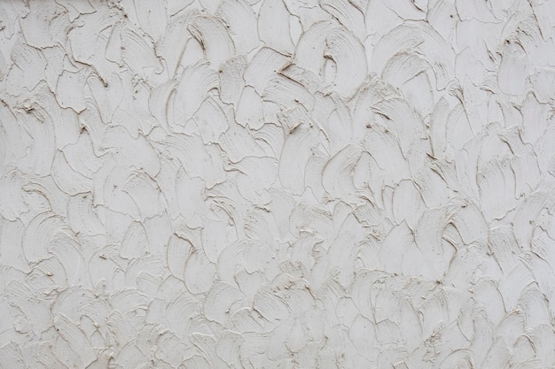 White abstract background Coarse surface texture Decorative plaster Wall decoration