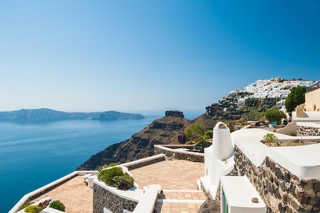 White architecture on Santorini island, Greece. Terrace in the hotel. Beautiful landscape with sea view