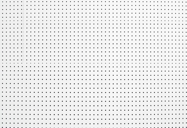 Photo a white background with a black dot that says  dots