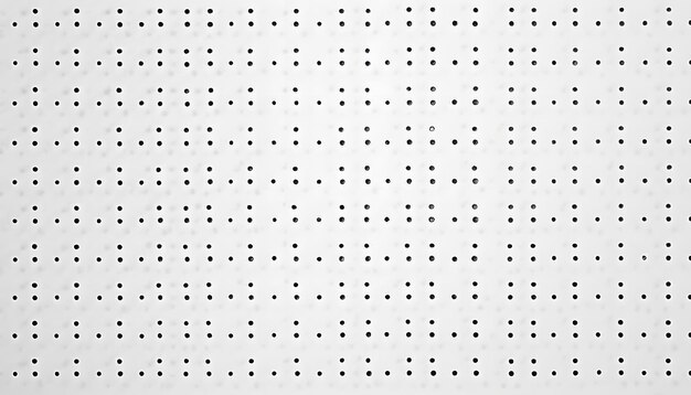 Photo a white background with a pattern of holes in the middle