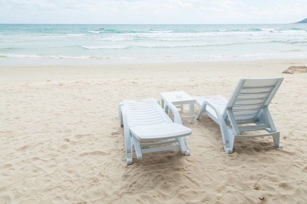 White benches and tables.