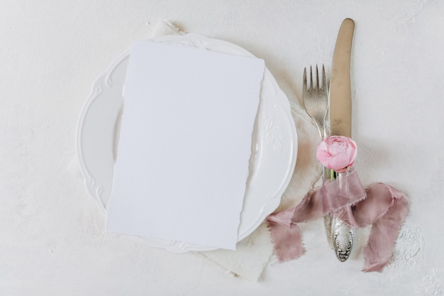 white blank sheet of paper on a plate menu mockup invitation mockup business card or letter mocku