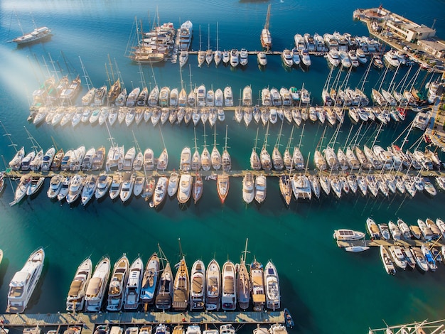 White boats and yachts moored in marina Turkey Riviera during sunset yachts in marina Aegean sea