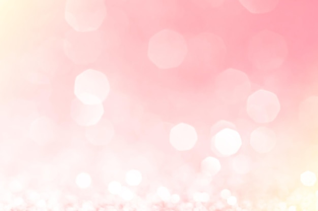 White bokeh lights in pink background