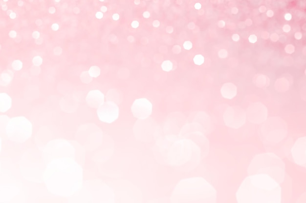 White bokeh lights in pink background