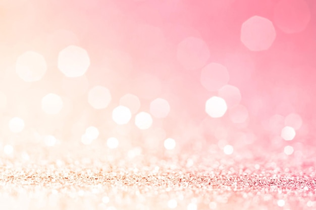 White bokeh lights in pink background