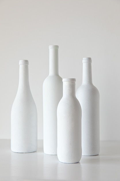 white bottles on white background minimal style decoration