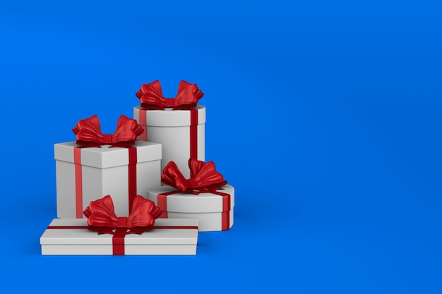 White boxes with red bow on blue. Isolated 3D illustration