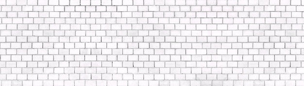 White brick wall background texture of stone blocks light panorama