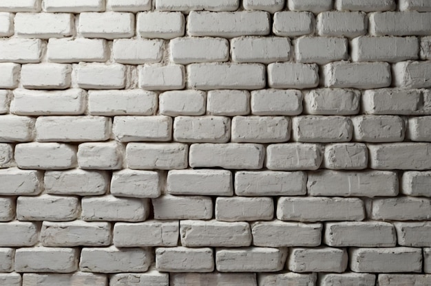 a white brick wall with a white brick pattern