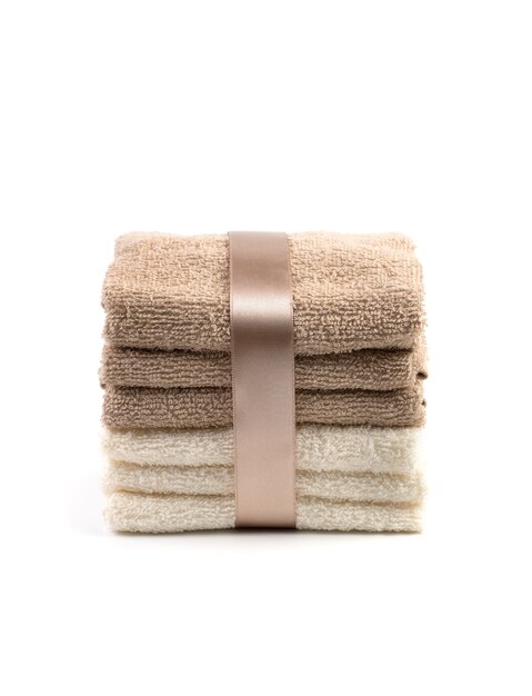 White and brown towels tied with satin ribbon