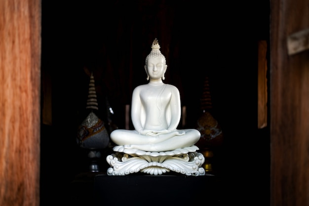 White buddha statue in thai lanna temple