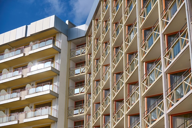 White building hotel with many terraces