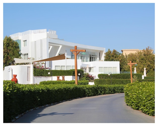 A white building with a cross on it