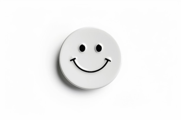 Photo a white button with a smiley face on it