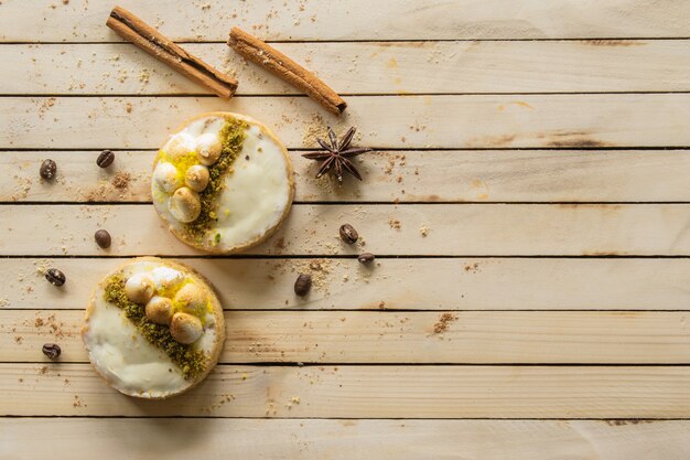 White cake on a wooden background sweets top view