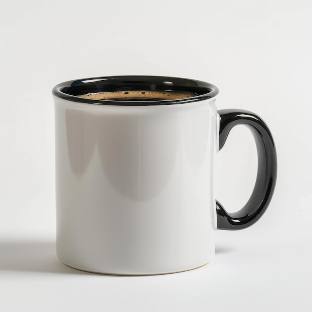 White ceramic coffee mug with black interior and handle on plain background