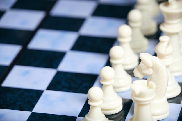 White chess pieces on a chessboard