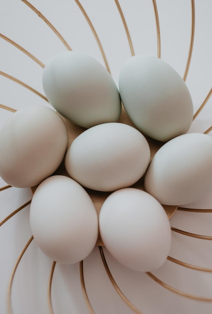 white chicken eggs eggs in the basket white eggs on a white backgroundmeal natural product