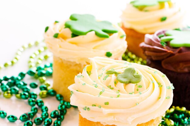 White chocolate cupcakes with white chic mousse and white buttercream frosting for St. Patrics Day.